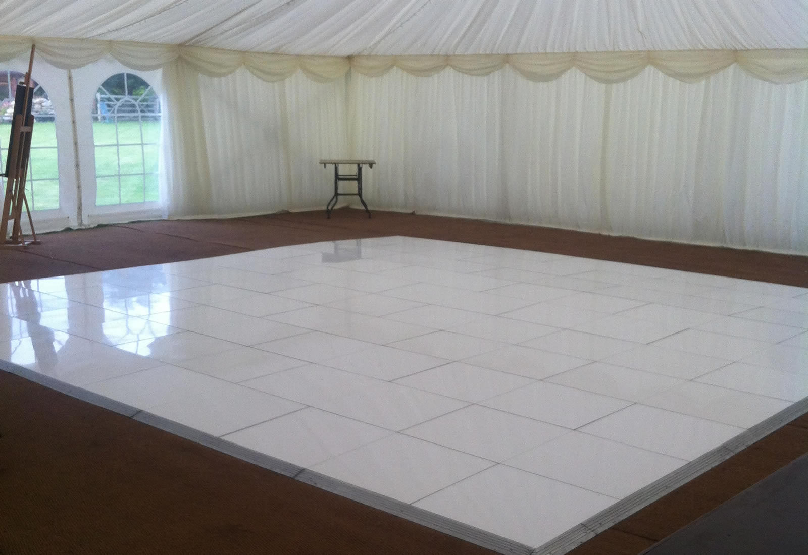 White dance floor in marquee
