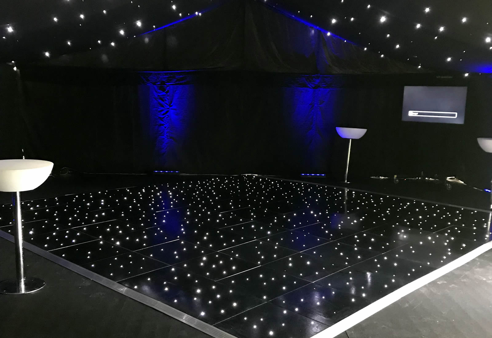 LED dance floor and star cloth in marquee